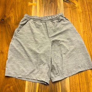 Men’s small lululemon shorts, pacebreaker 9 inch inseam. Great condition. Grey.